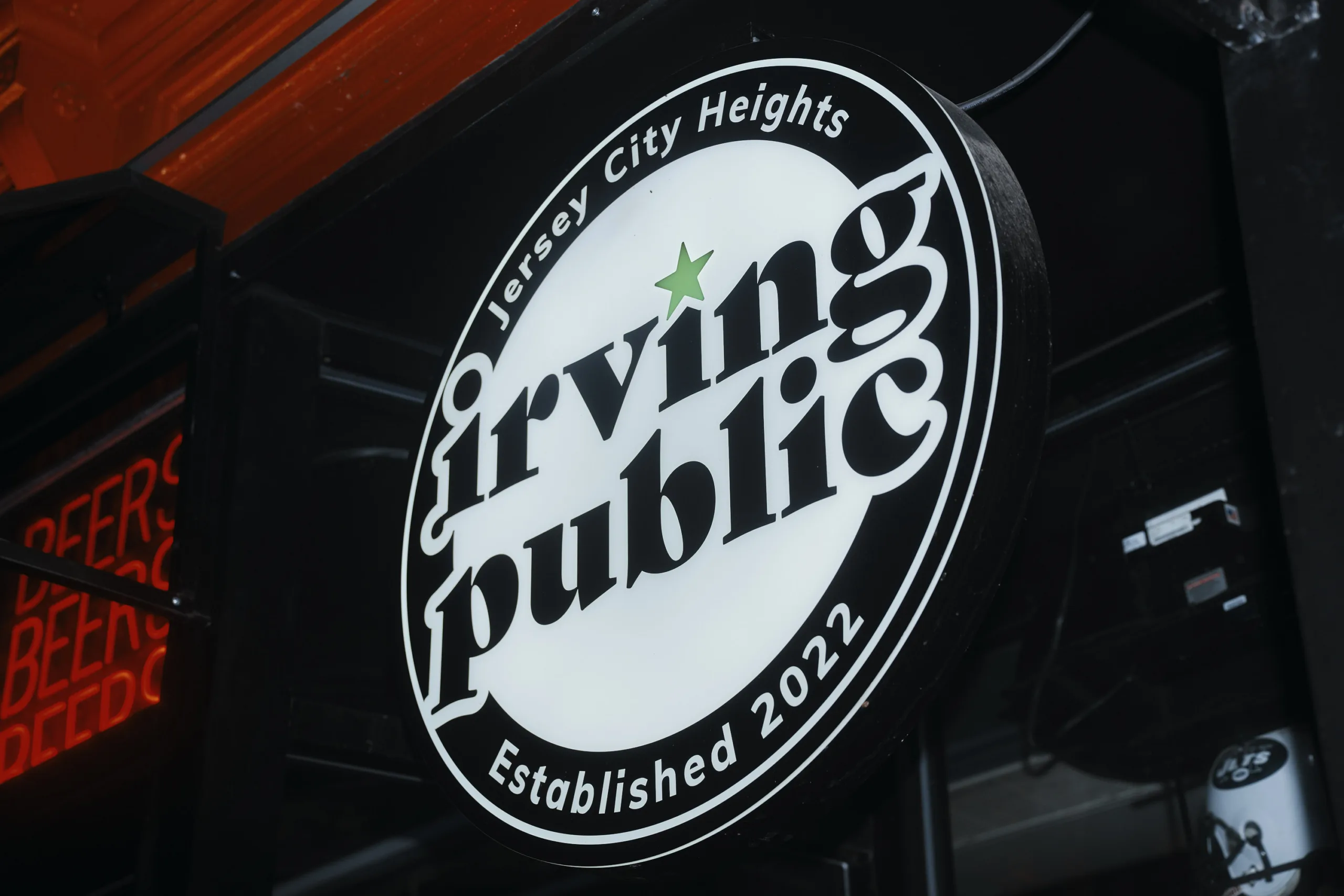 Irving Public window sign in Jersey City Heights
